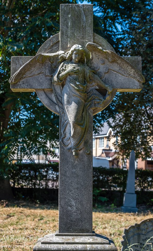 Headstone in Cemetery at Colliers Wood, London, UK Tamron 70mm Lens