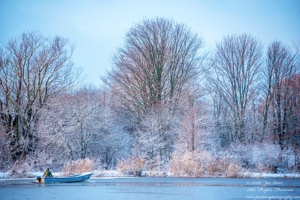 Fishing in the Morning on the Daugava River in Winter. Nikkor 300mm