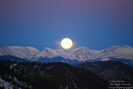 Moon set in the Rockies. Nikkor 200mm