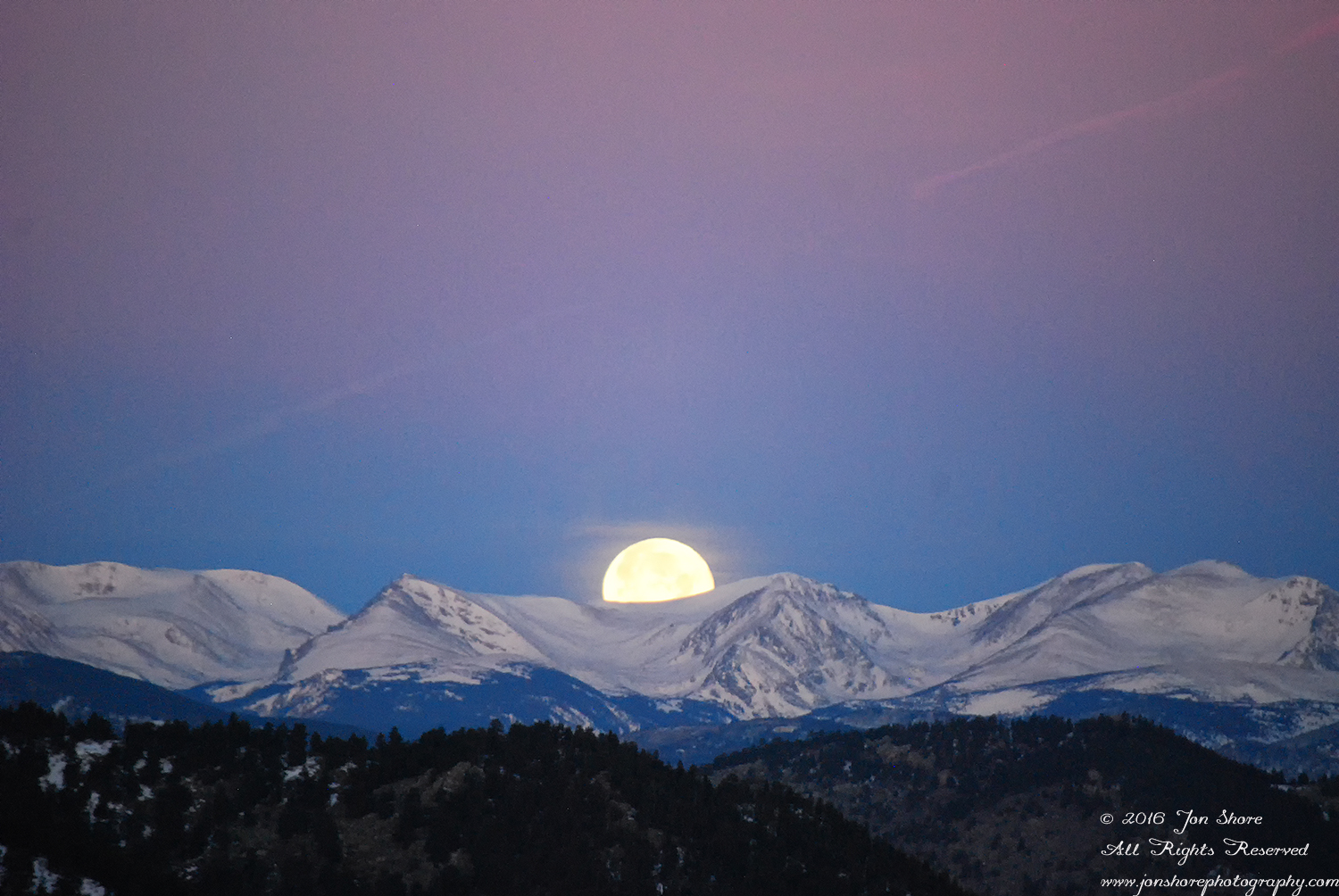 Moon set in the Rockies. Nikkor 200mm