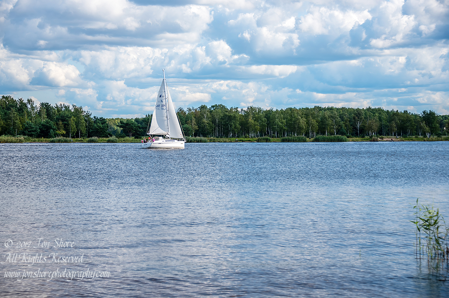 Sailboat on the Lielupe River Latvia August 2017 by Jon Shore