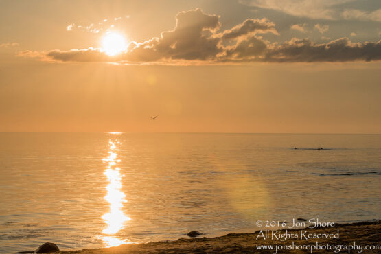 Sunset Tuja, Latvia with boys in the sea. Tamron 200m