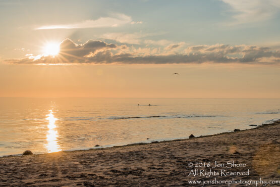 Sunset Tuja, Latvia with boys in the sea. Tamron 200m