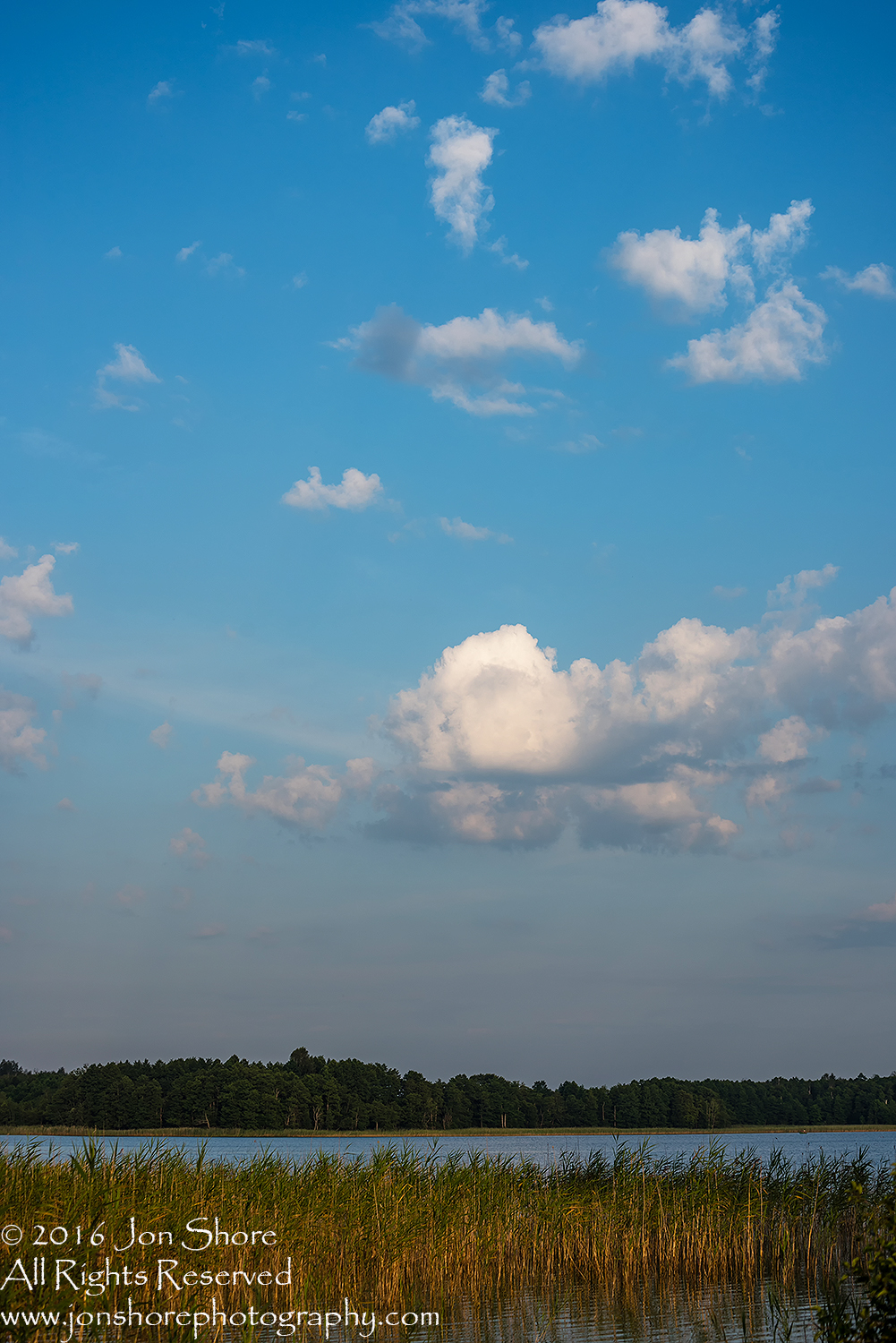 Clouds over lake Latgale, Latvia. Tamron 70mm