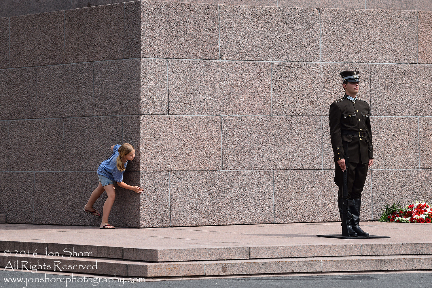Child spying on Guard at Riga, Latvia Freedom Monument