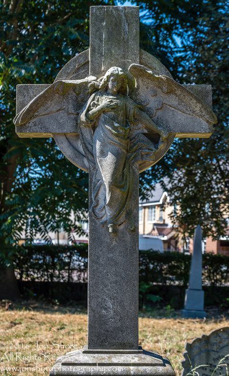 Headstone in Cemetery at Colliers Wood, London, UK Tamron 70mm Lens