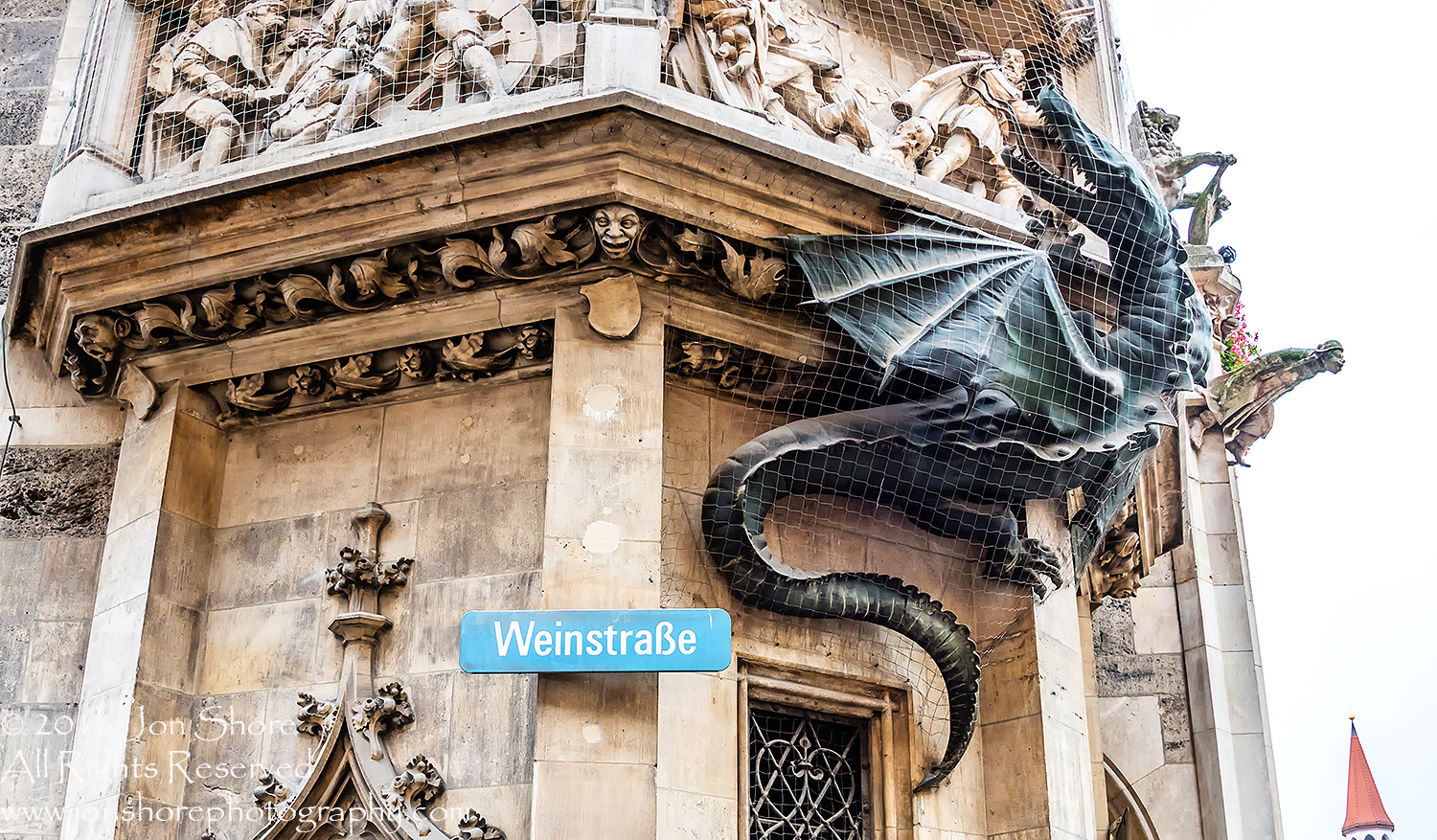Netted Dragon on Munich City Hall. Nikkor 300mm