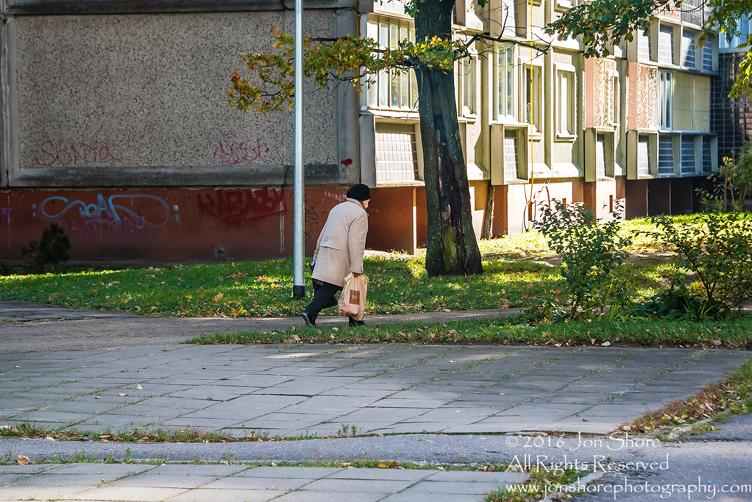 Old woman walking with bag. Zolitude, Latvia. Nikkor 200mm