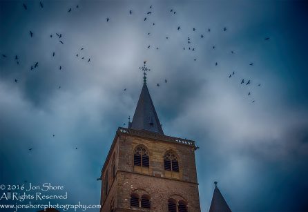 Crows atop Cathedral, Trier, Germany. Nikkor 300mm