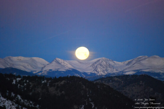 Moon set in the Rockies. Nikkor 200mm